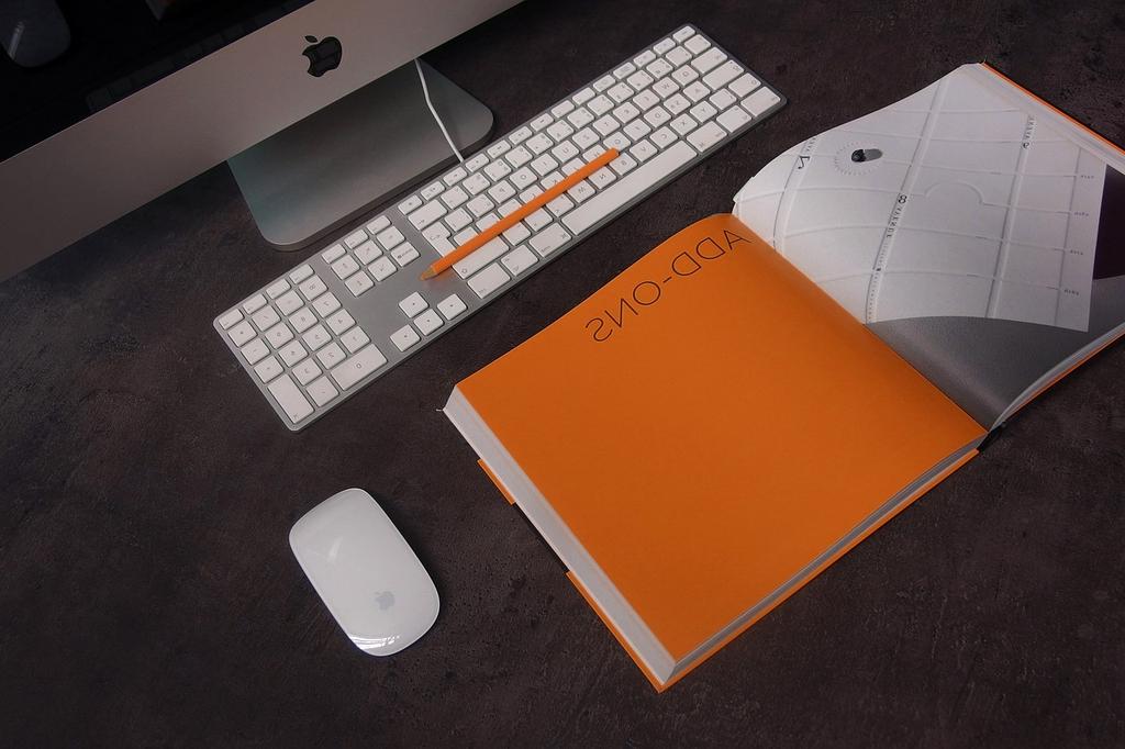 Modern digital workspace with organized files and documents on computer screens